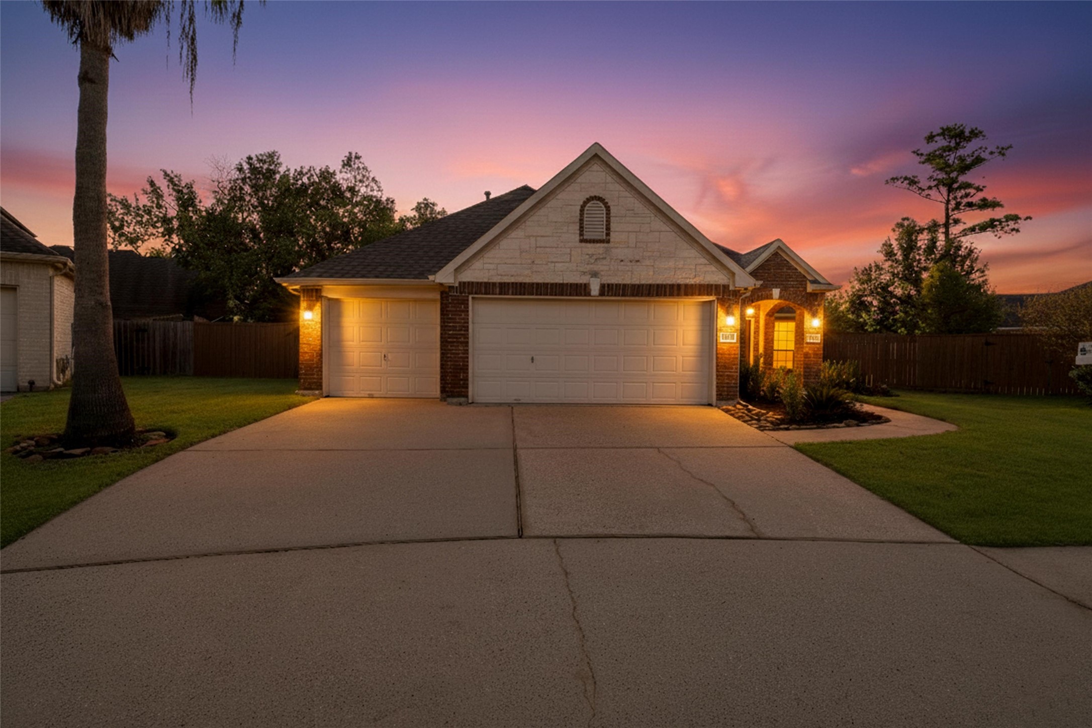 3303 Viking Landing Court Spring, TX 77388 - Photo 2 of 46 a front view of a house with a yard and garage
