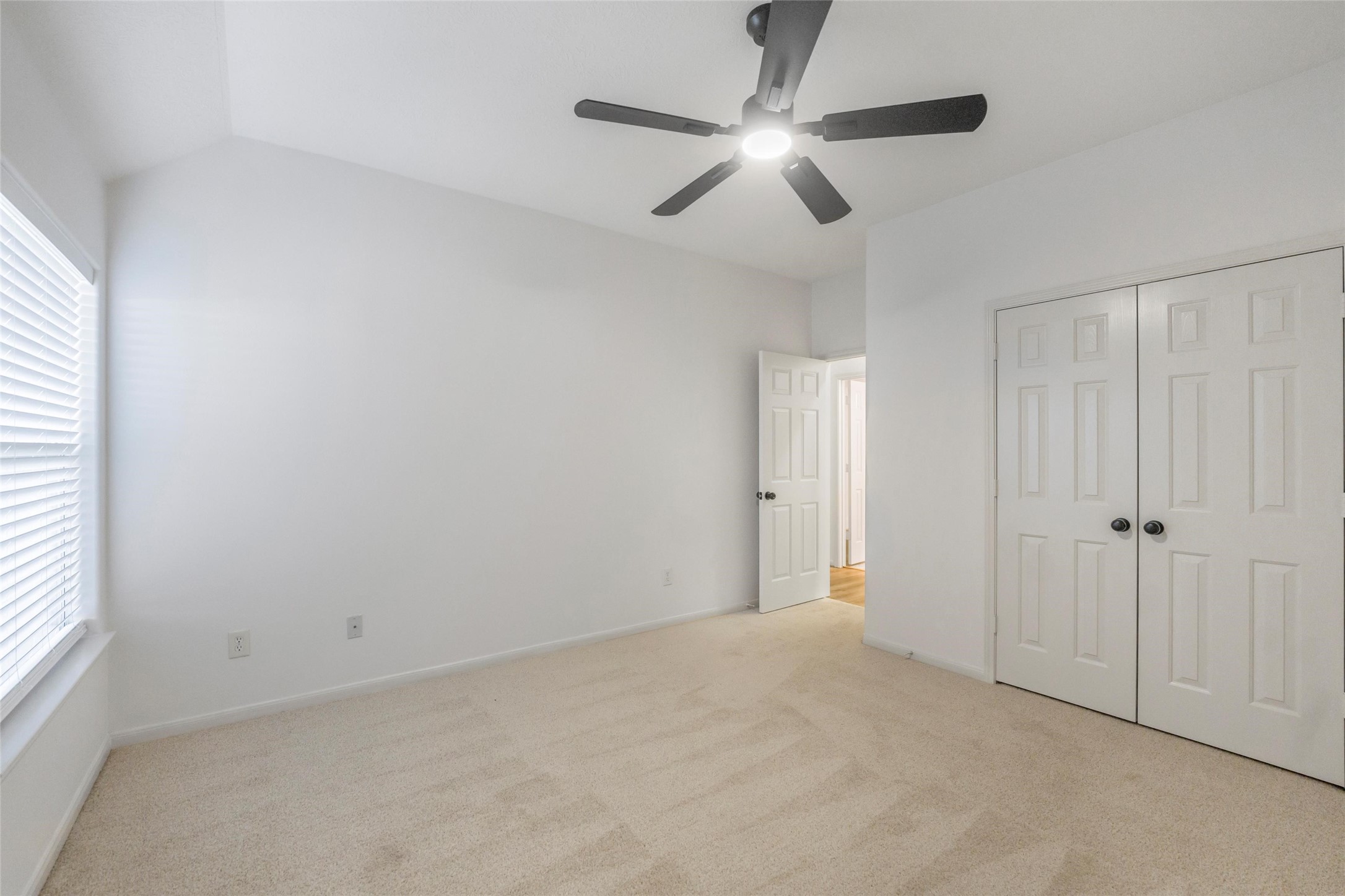 3303 Viking Landing Court Spring, TX 77388 - Photo 34 of 46 an empty room with chandelier fan