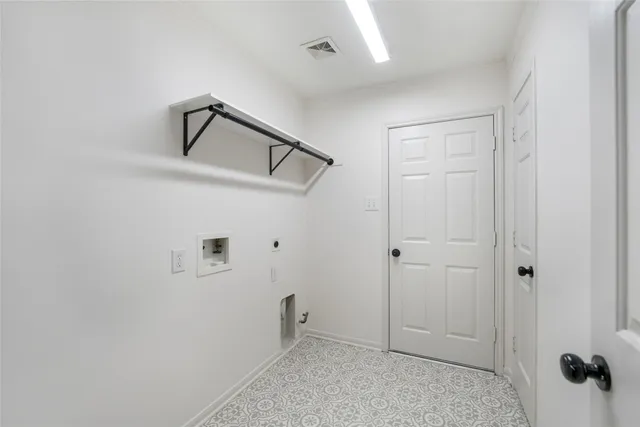 a view of room with hardwood floor