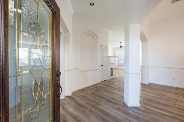 a view of entryway with wooden floor