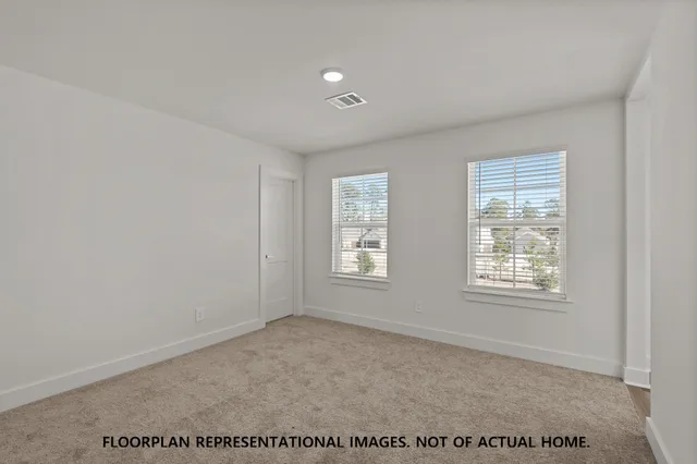 a bathroom with a bathtub and window