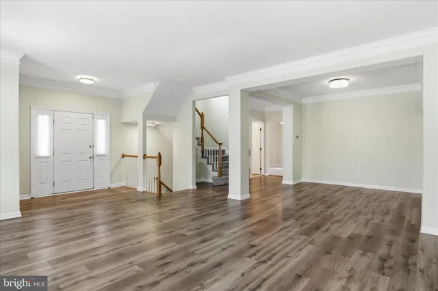 a kitchen with stainless steel appliances a stove a sink and a microwave