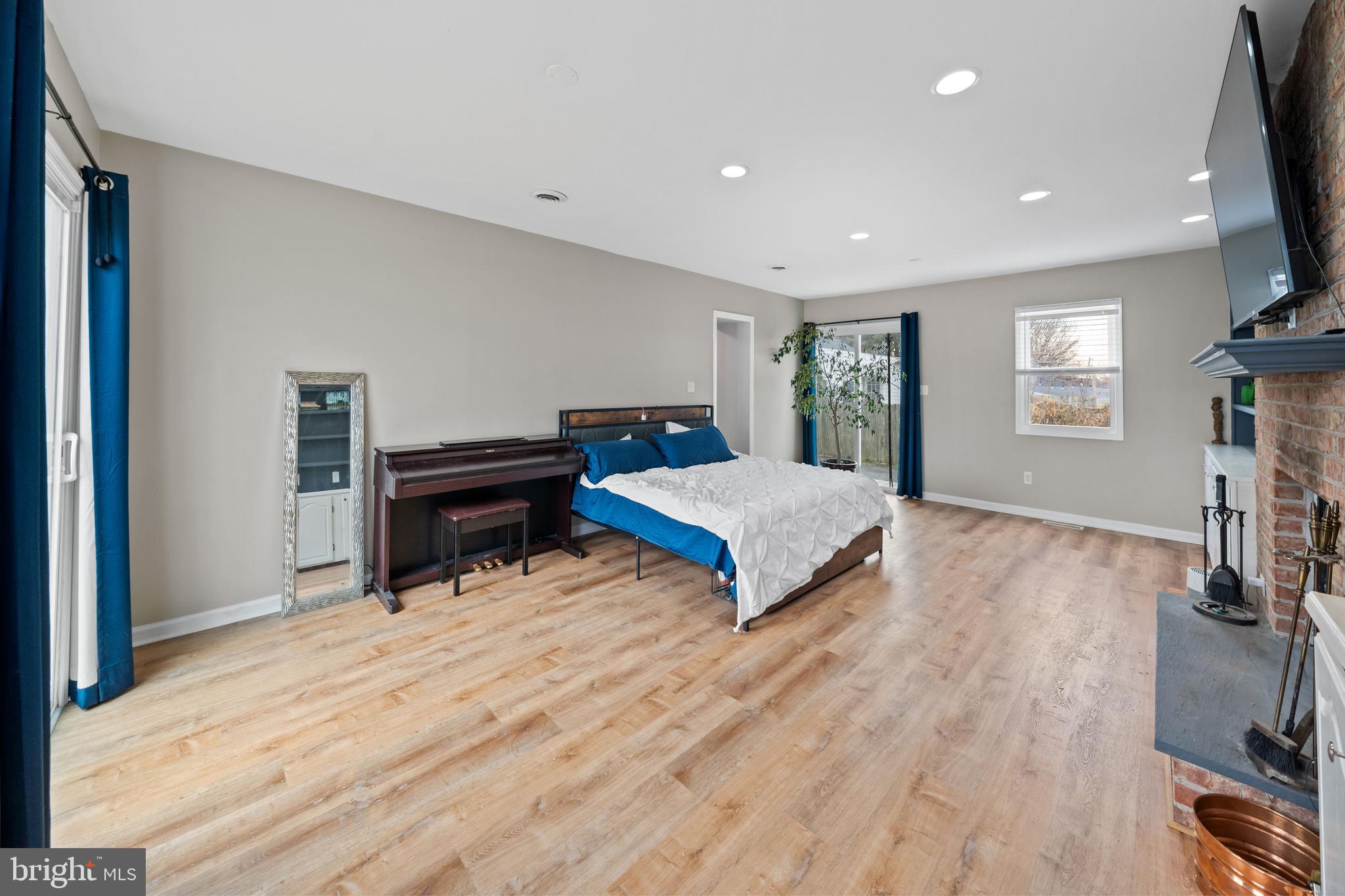 704 Harwood Road Wilmington, DE 19804 - Photo 18 of 30 a bedroom with furniture and a wooden floor