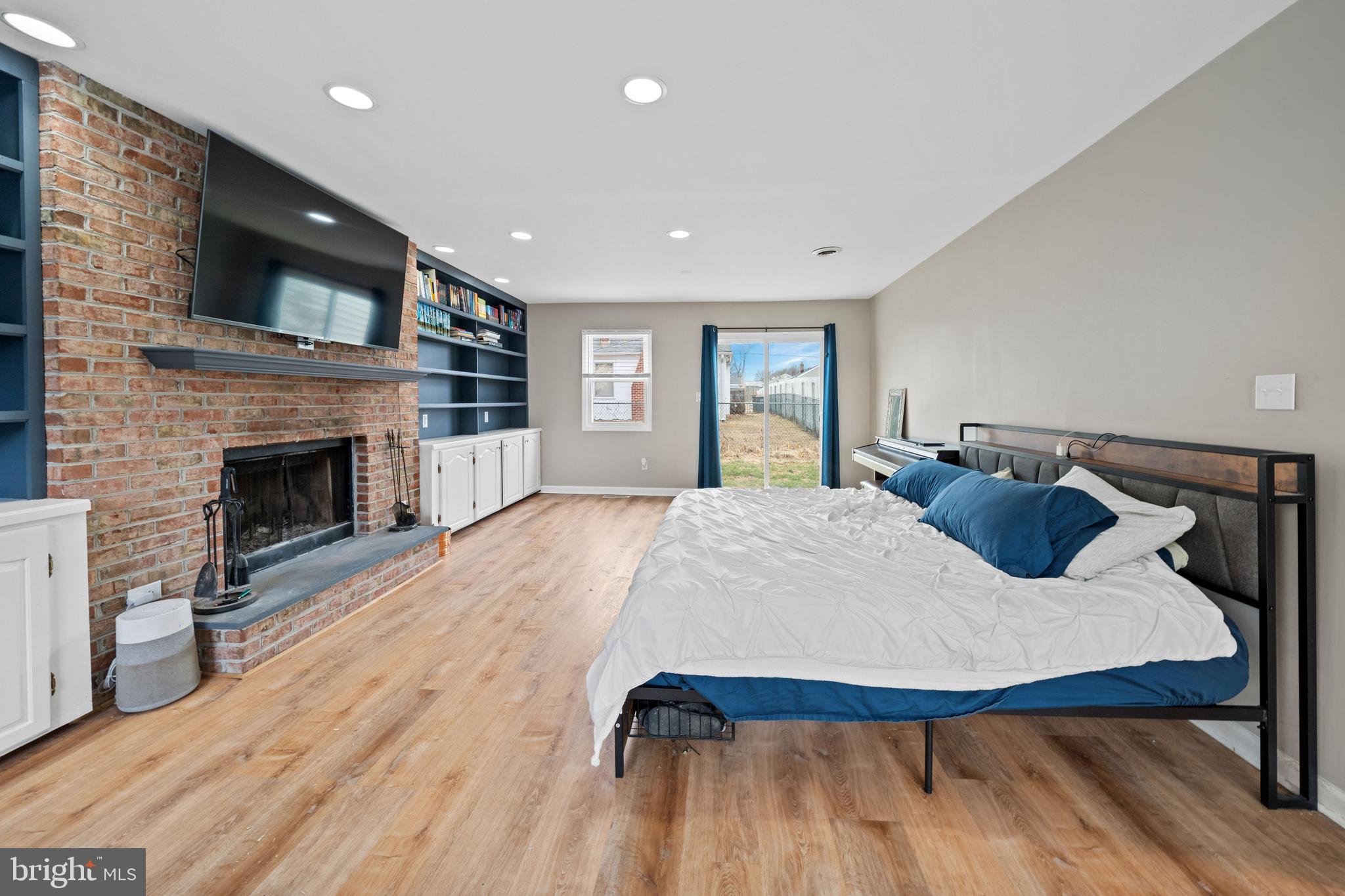 704 Harwood Road Wilmington, DE 19804 - Photo 19 of 30 a living room with furniture and a fireplace