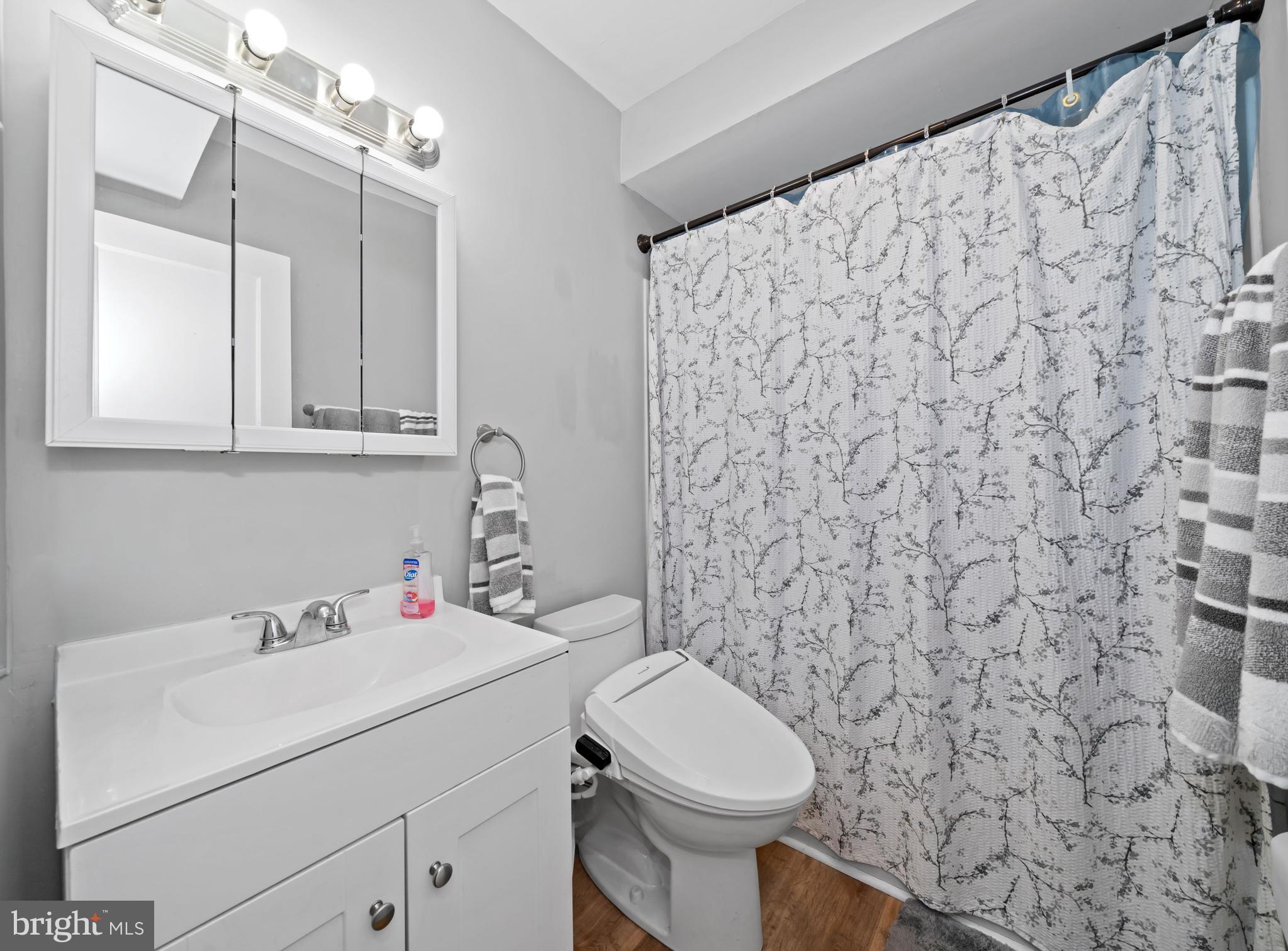 704 Harwood Road Wilmington, DE 19804 - Photo 26 of 30 a bathroom with a sink and a toilet