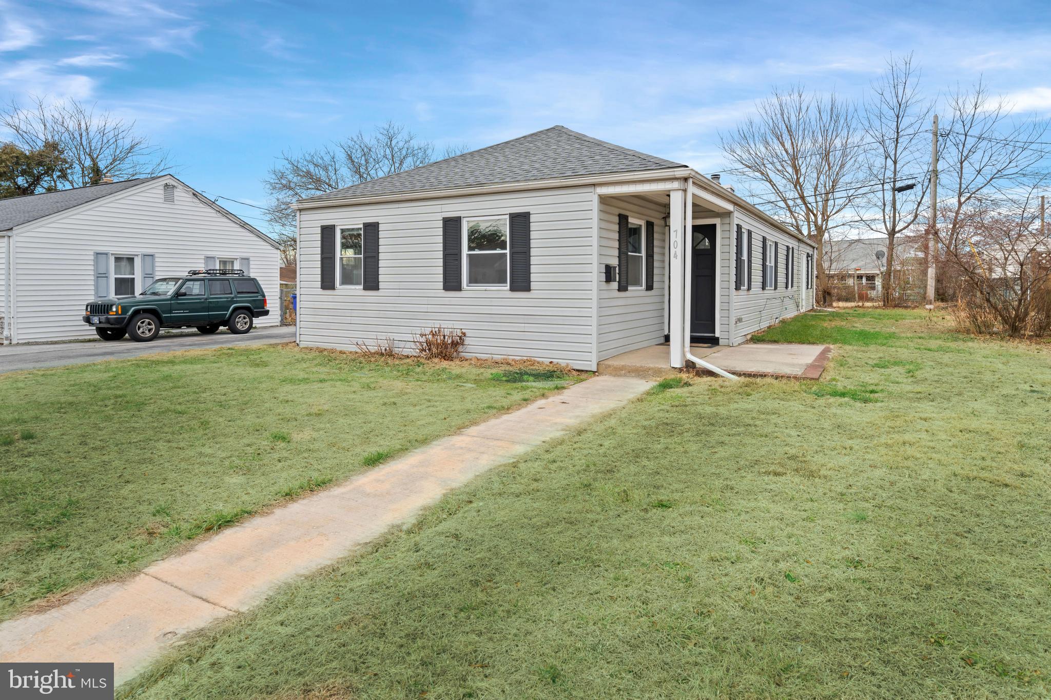 704 Harwood Road Wilmington, DE 19804 - Photo 3 of 30 a front view of a house with a yard and garage