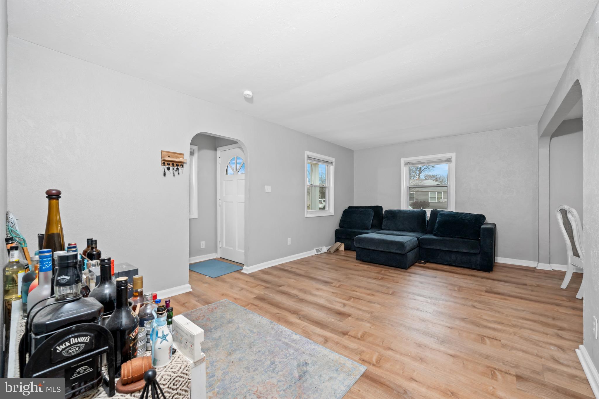 704 Harwood Road Wilmington, DE 19804 - Photo 5 of 30 a bedroom with a bed and wooden floor