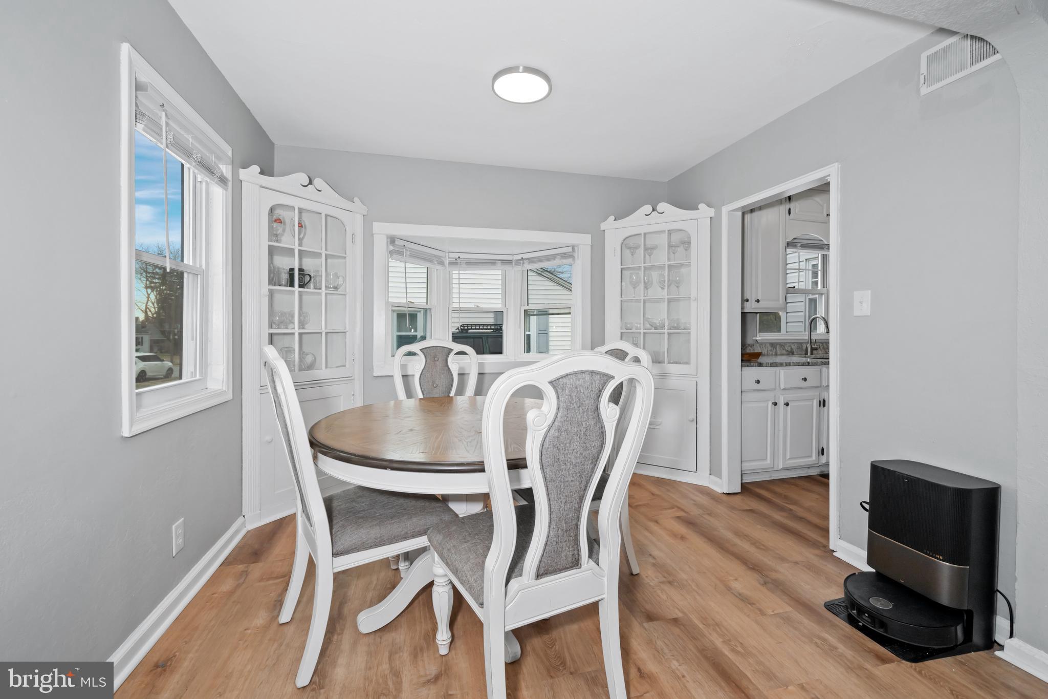 704 Harwood Road Wilmington, DE 19804 - Photo 8 of 30 a view of a dining room with furniture and wooden floor