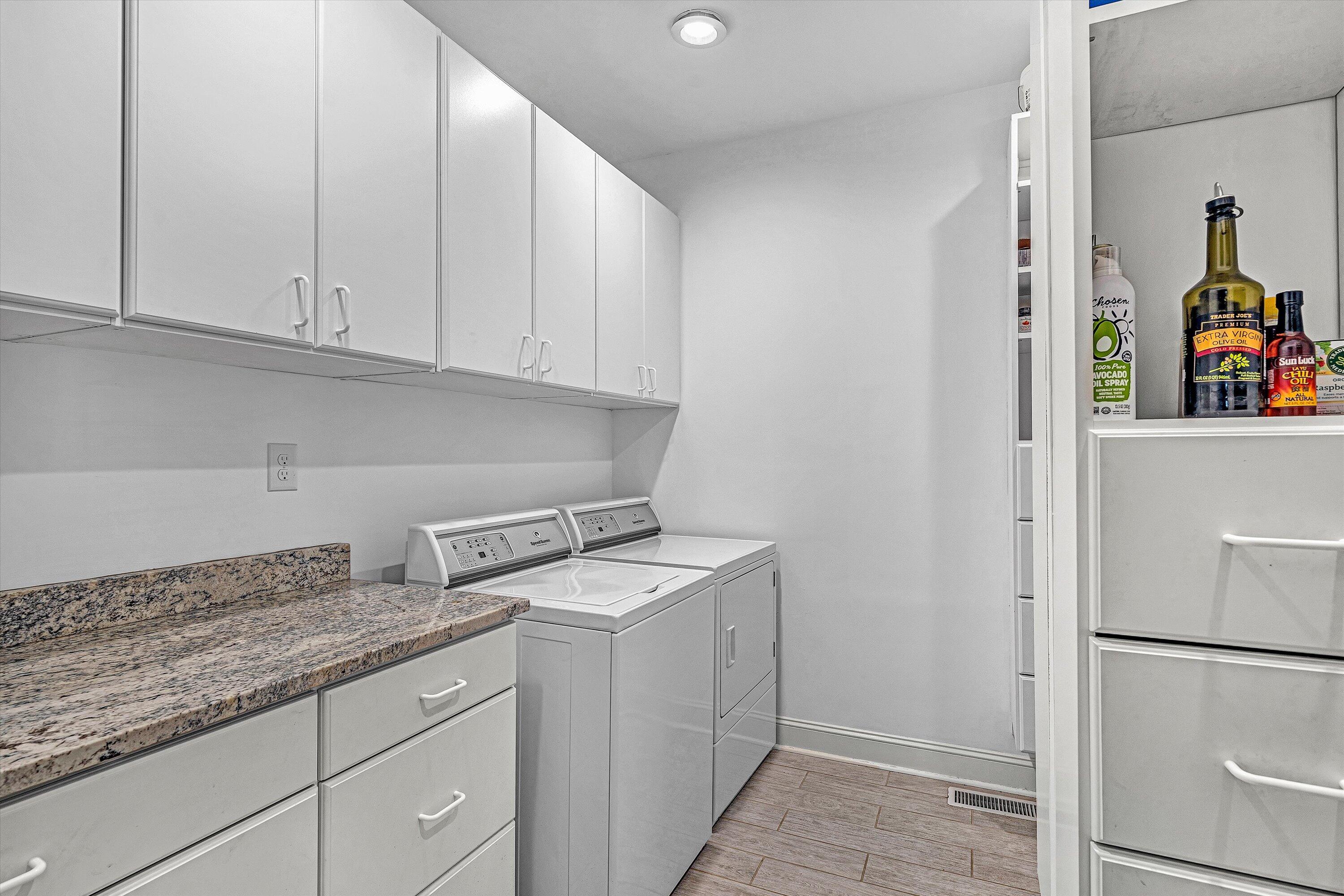 10947 Bottom Creek Road Bent Mountain, VA 24059 - Photo 15 of 59 a utility room with sink dryer and washer