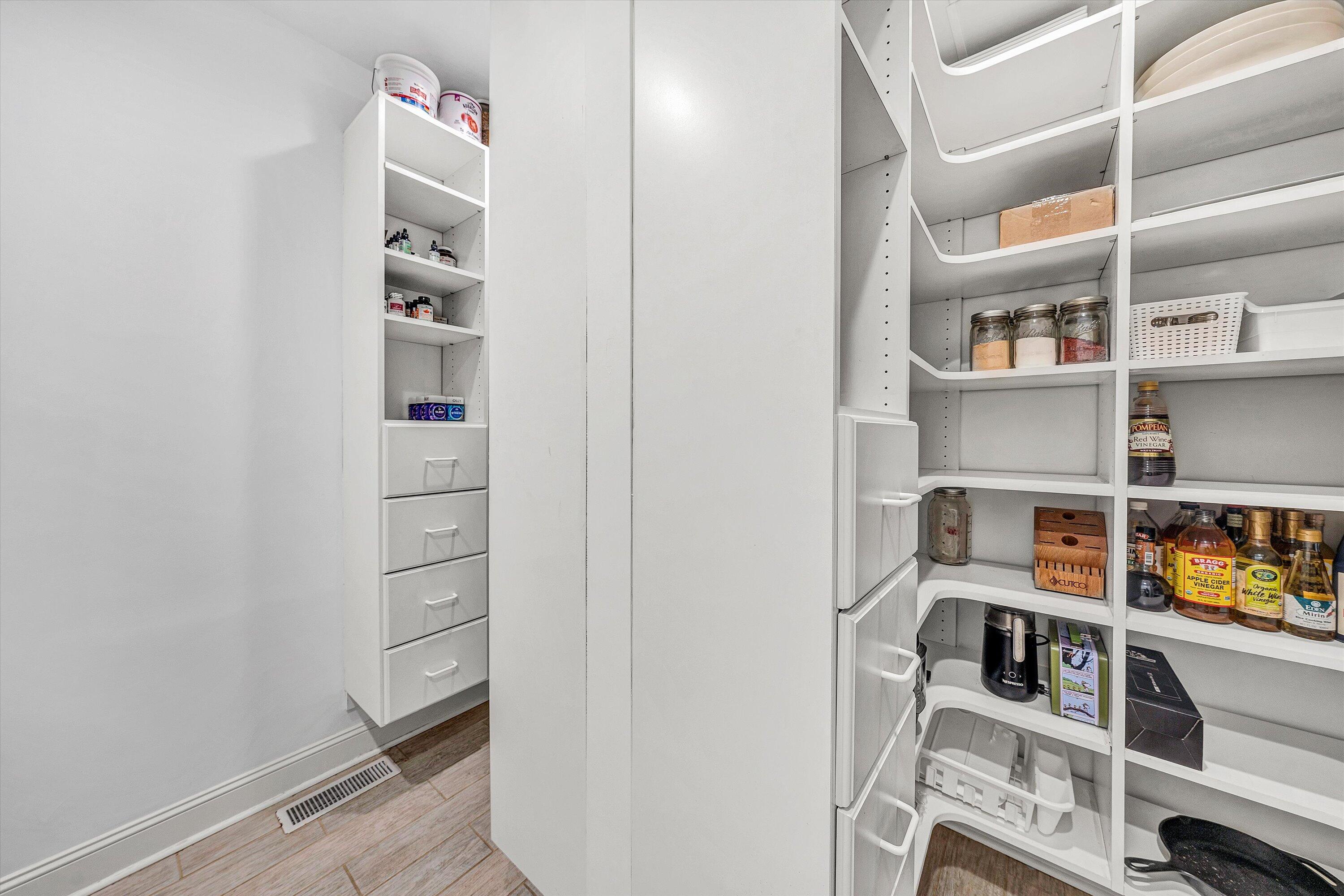 10947 Bottom Creek Road Bent Mountain, VA 24059 - Photo 16 of 59 a view of walk in closet with clothes and shoes
