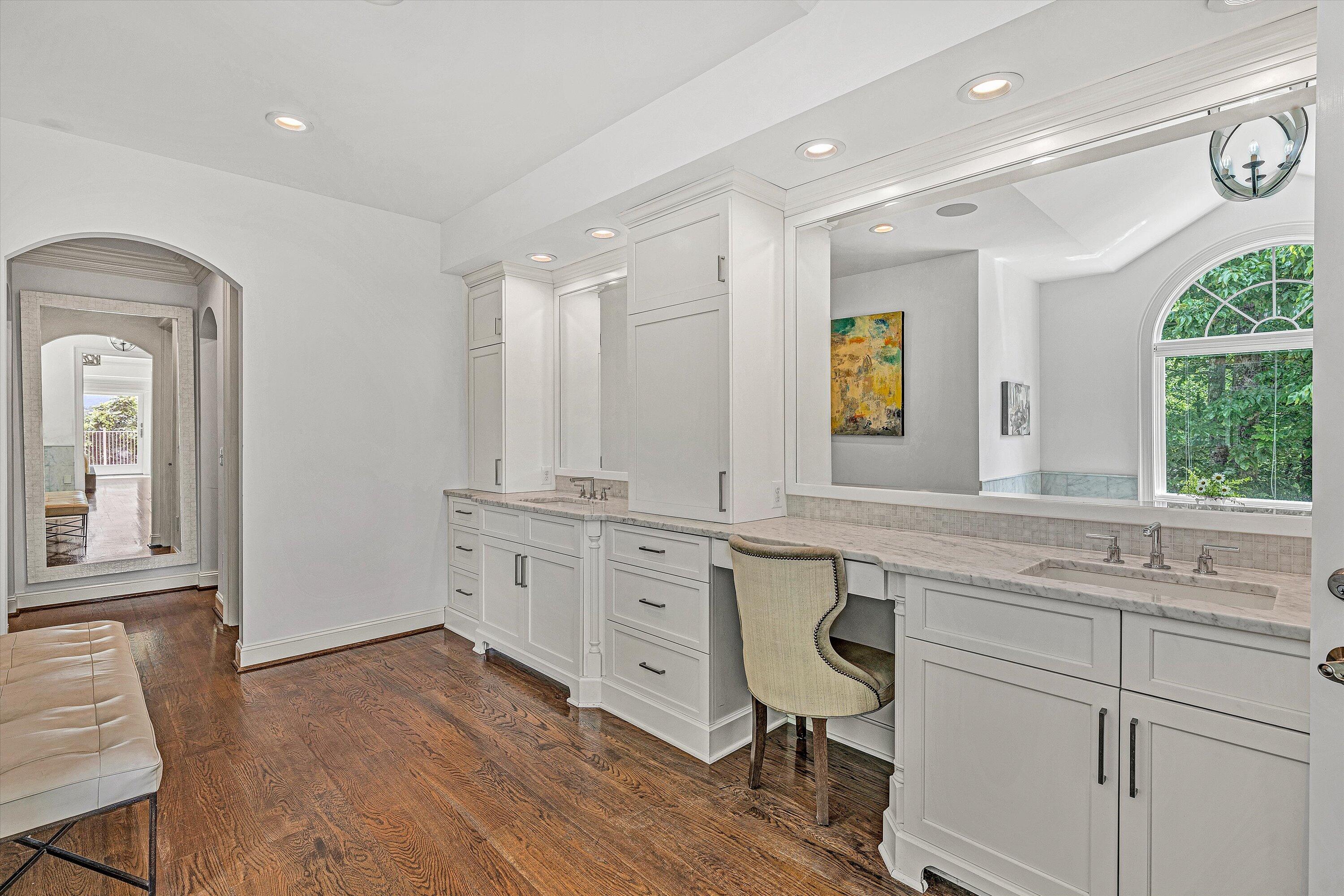 10947 Bottom Creek Road Bent Mountain, VA 24059 - Photo 23 of 59 a spacious bathroom with a granite countertop sink mirror and a toilet
