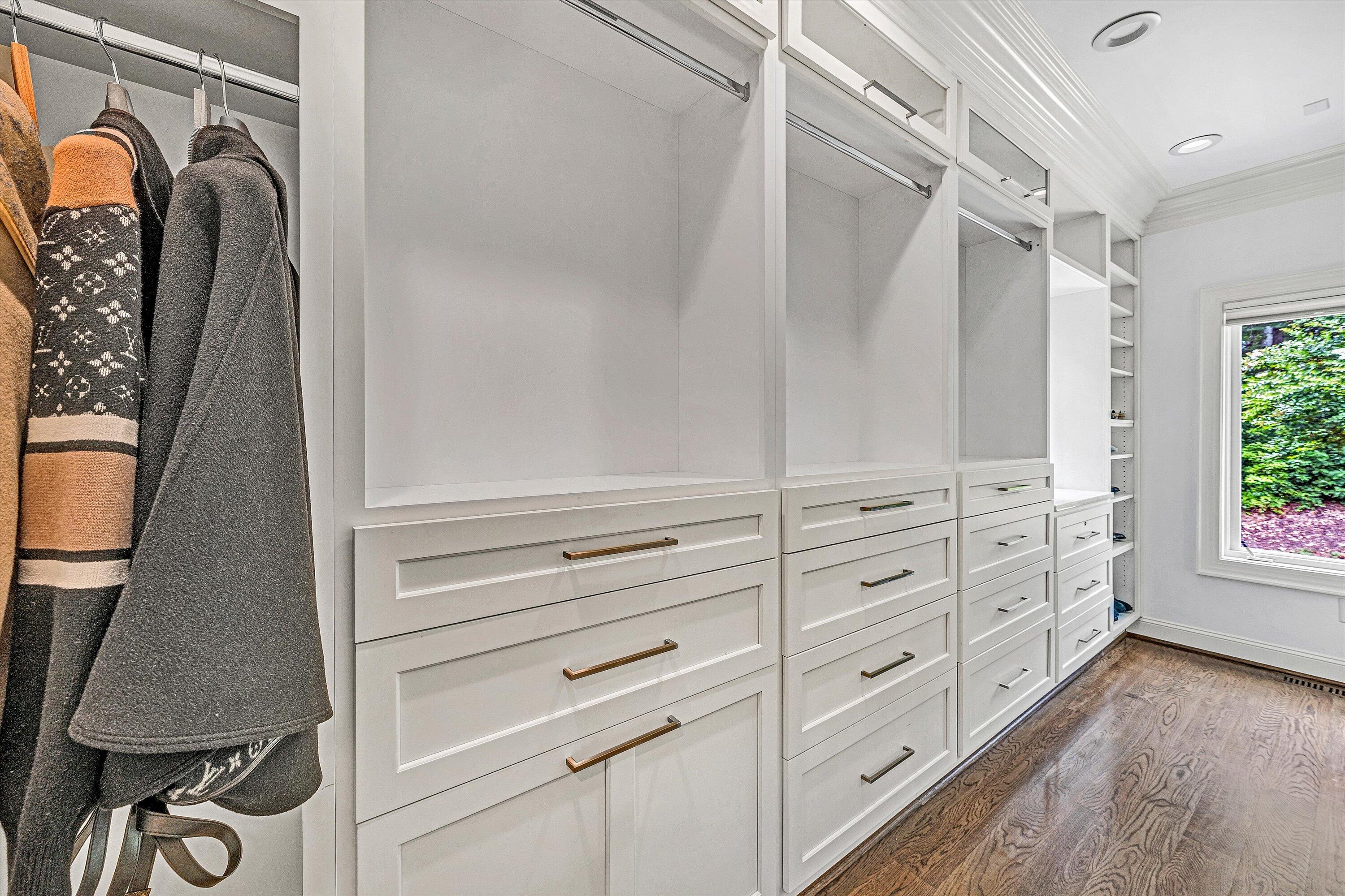 10947 Bottom Creek Road Bent Mountain, VA 24059 - Photo 27 of 59 a view of walk in closet with clothes and shoes