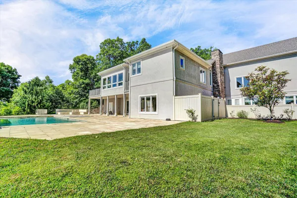 a utility room with sink dryer and washer