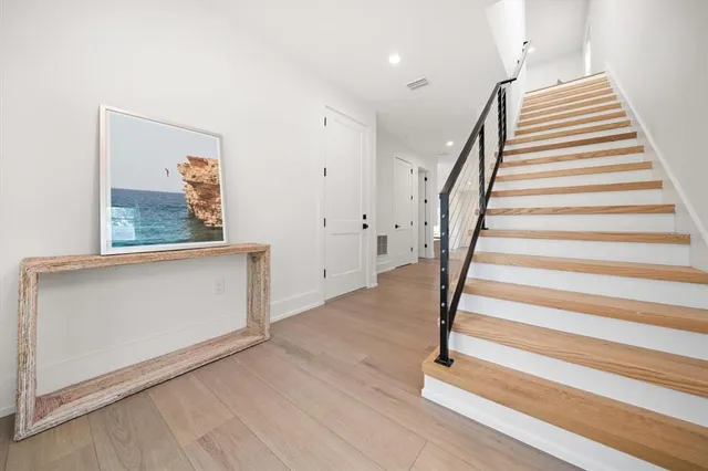a view of entryway with wooden floor