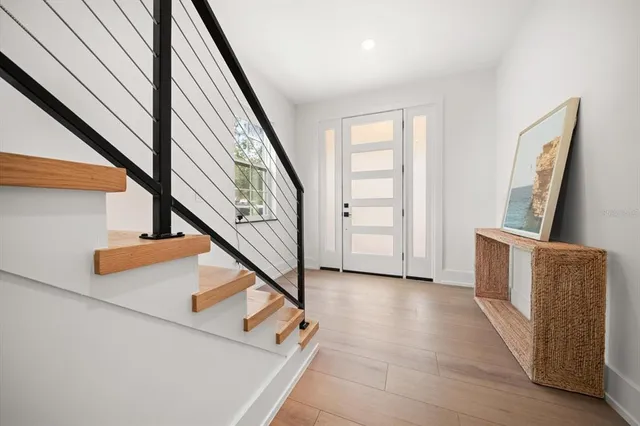 a view of an entryway with staircase