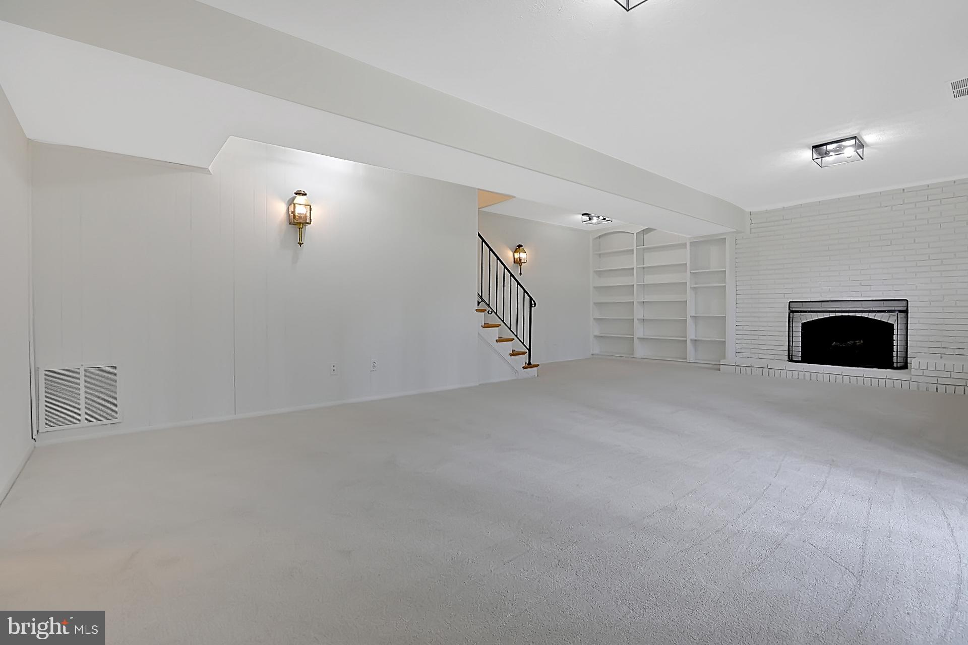 2407 Bugle Lane Reston, VA 20191 - Photo 23 of 37 a view of empty room with fireplace