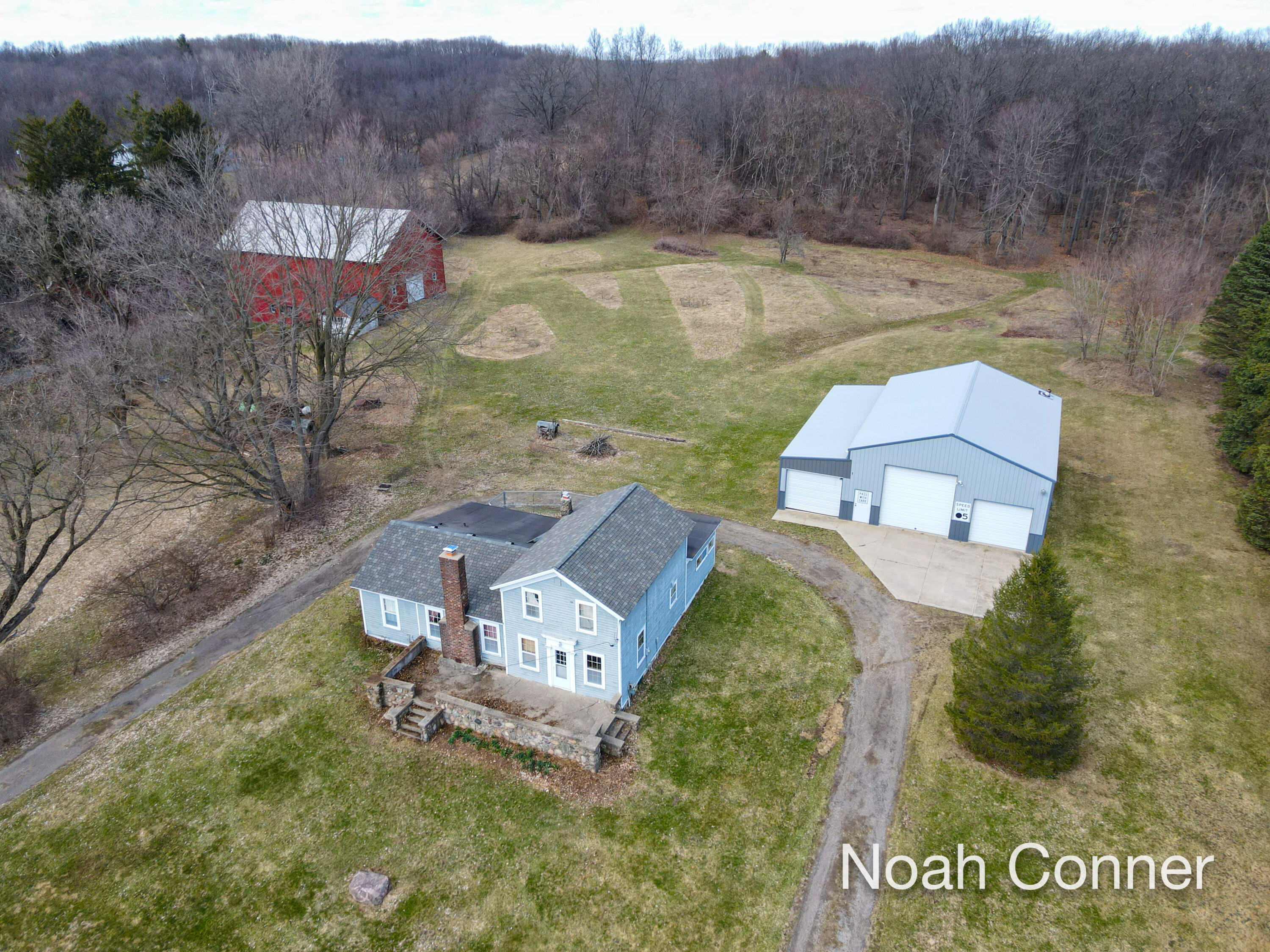 5295 Belding Road Northeast Rockford, MI 49341 - Photo 35 of 43 dji_fly_20260327_152458_124_177463950468