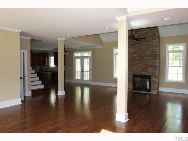 3436 Griffice Mill Road Raleigh, NC 27610 - Photo 10 of 10 View from front entryway shows open floor plan and stone fireplace