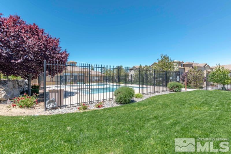 17000 Wedge Parkway, Unit 2925 Reno, NV 89511 - Photo 21 of 23 a view of a park with a bench and trees