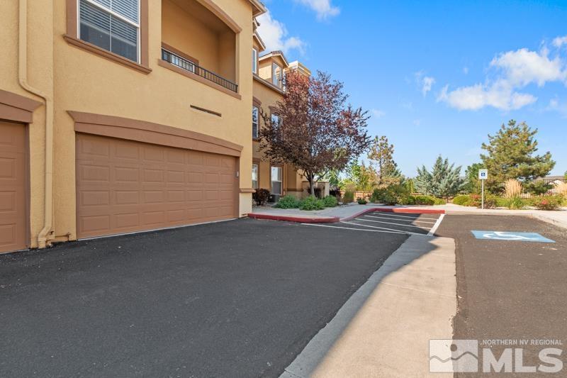 17000 Wedge Parkway, Unit 2925 Reno, NV 89511 - Photo 3 of 23 a view of a street with a building in the background