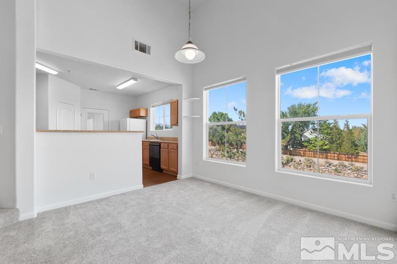 17000 Wedge Parkway, Unit 2925 Reno, NV 89511 - Photo 6 of 23 a view of a kitchen with furniture and a window