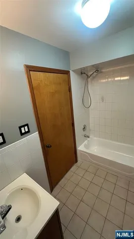 a bathroom with a sink and a tub