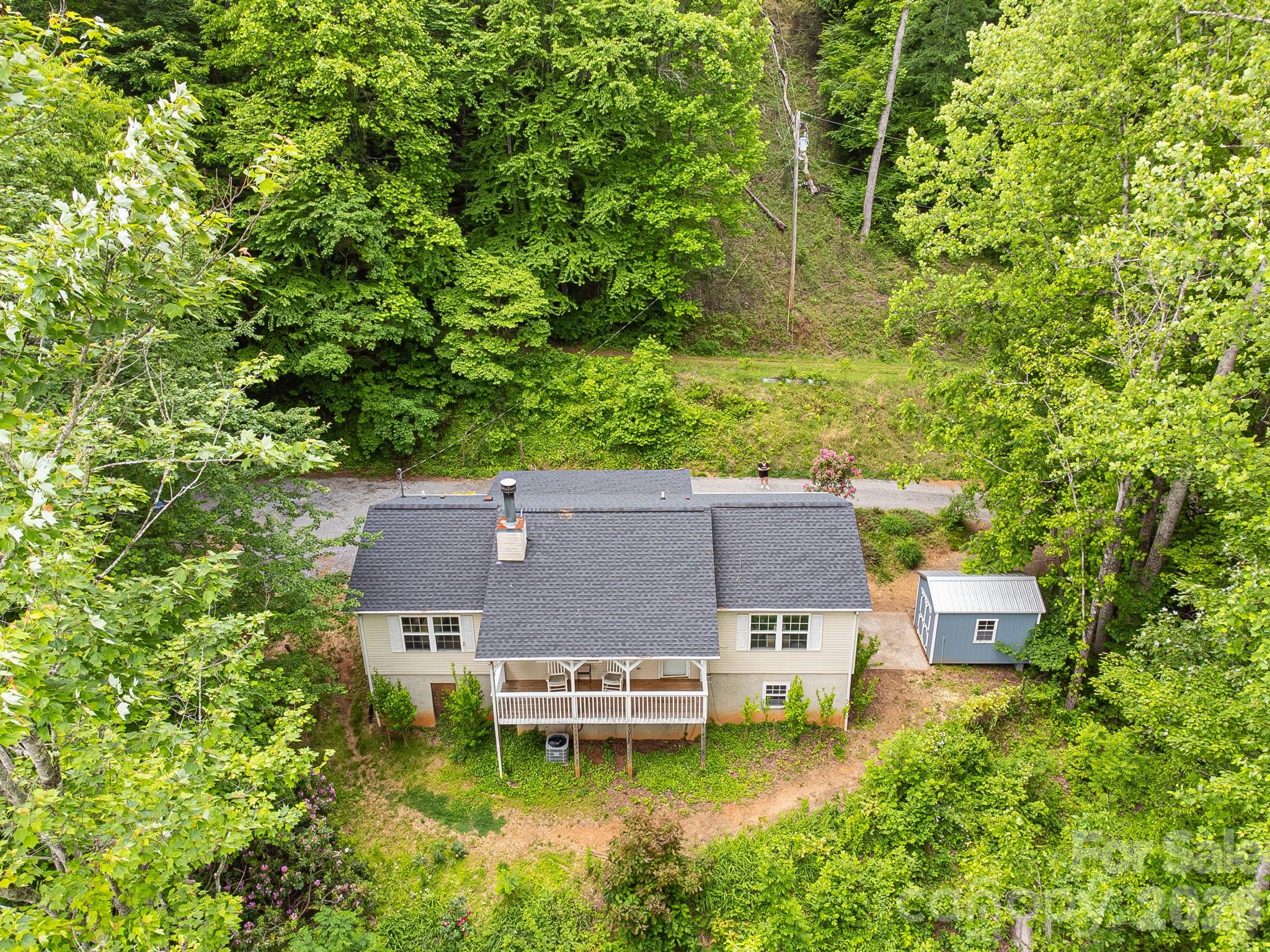 107 Mercy Ridge Sylva, NC 28779 - Photo 46 of 47 an aerial view of a house with a garden view