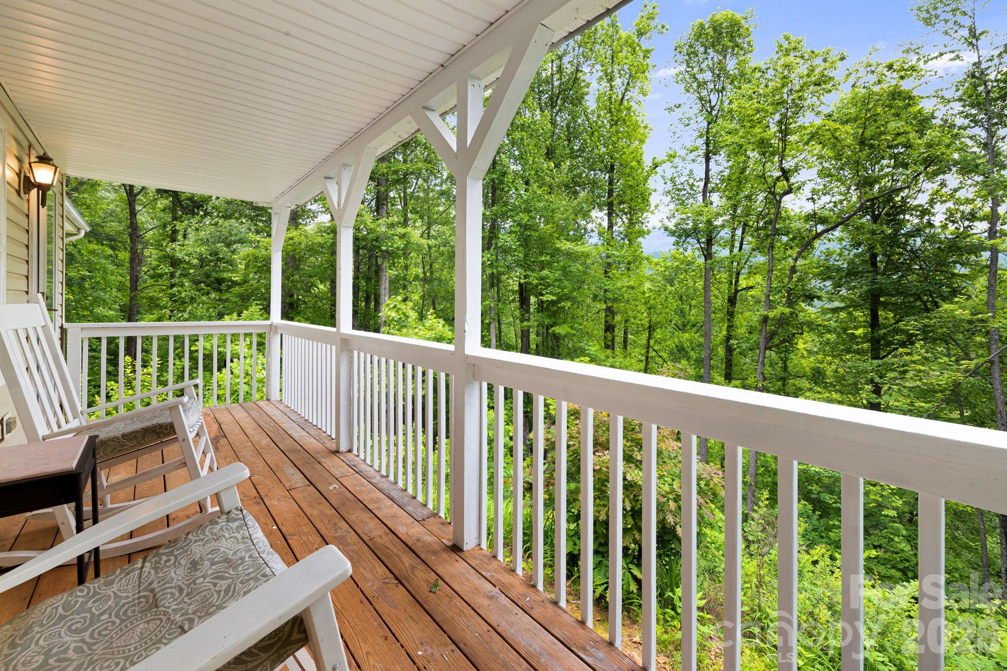 107 Mercy Ridge Sylva, NC 28779 - Photo 6 of 47 a view of a two chairs in the balcony