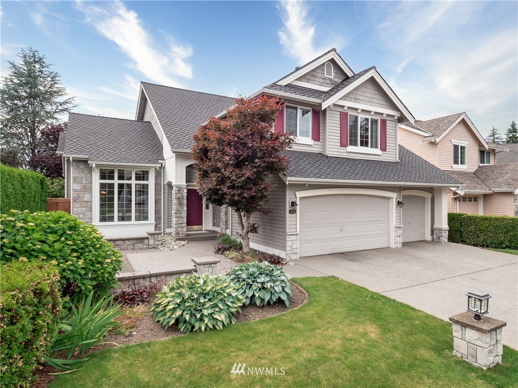 20104 27th Avenue Southeast Bothell, WA 98012 - Photo 1 of 27 front view of a house with a yard