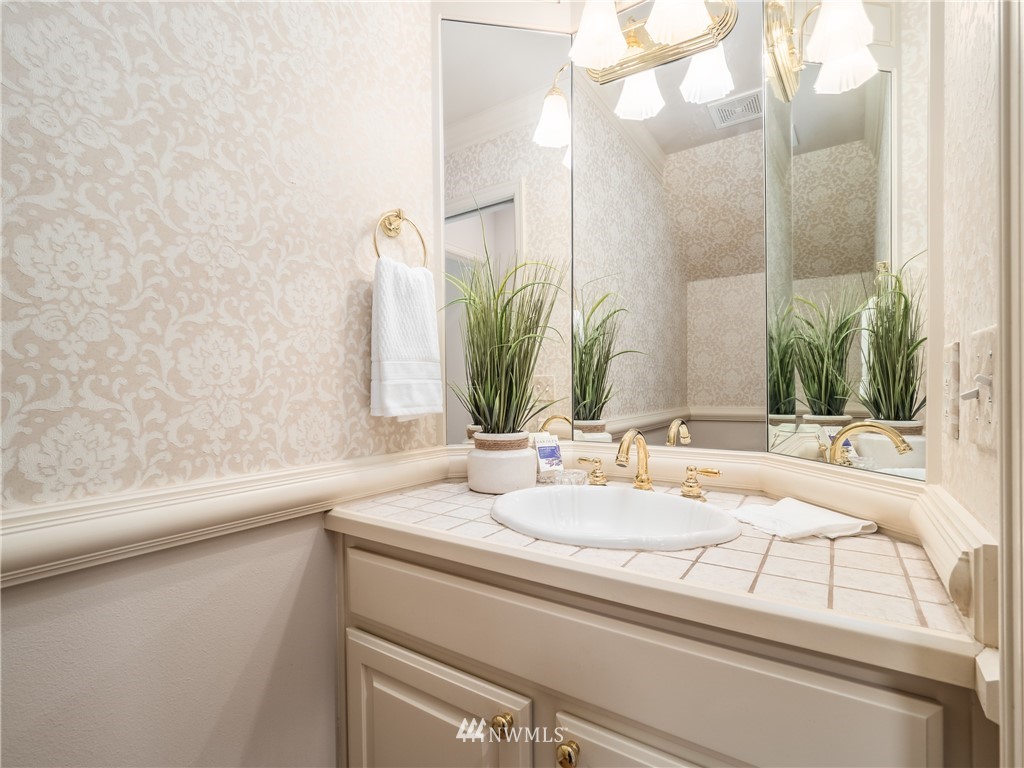 20104 27th Avenue Southeast Bothell, WA 98012 - Photo 12 of 27 a bathroom with a sink and a mirror