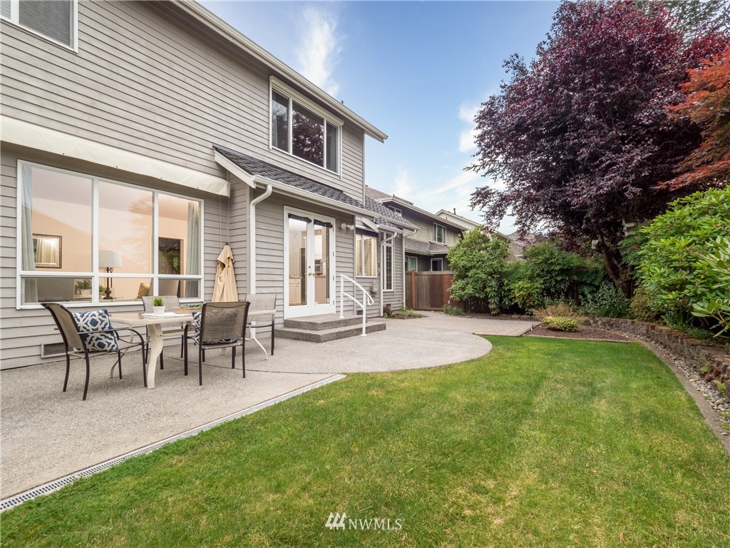 20104 27th Avenue Southeast Bothell, WA 98012 - Photo 24 of 27 a view of a house with a backyard and a patio