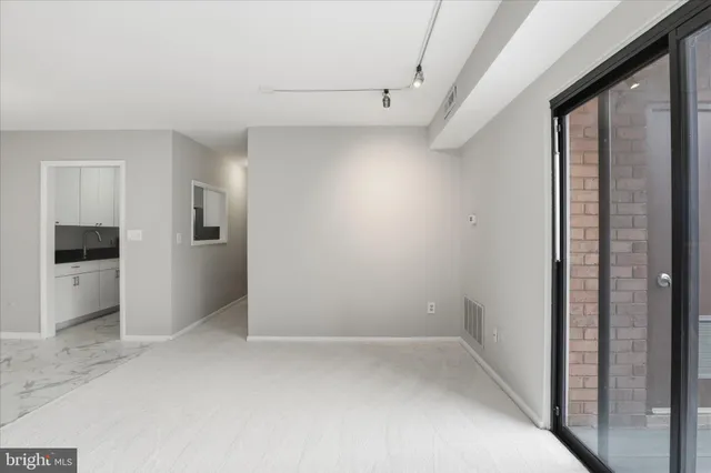 an empty room with windows