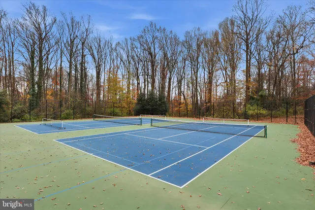 a view of a park with swings