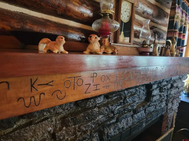 a kitchen with a refrigerator and a stove