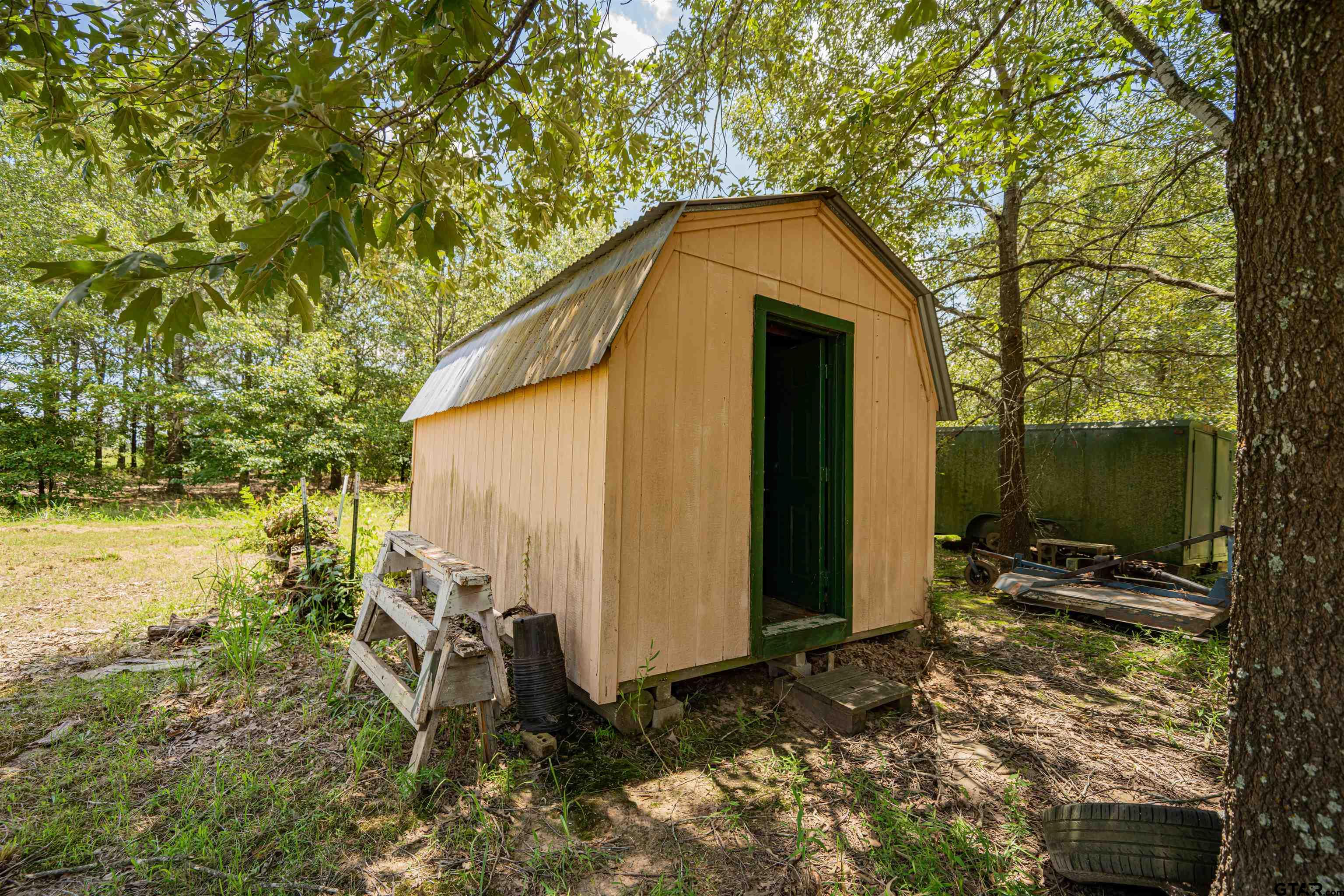 4510 Cr 2010 Mount Mount Vernon, TX 75457 - Photo 12 of 44 a backyard of a house with lots of green space
