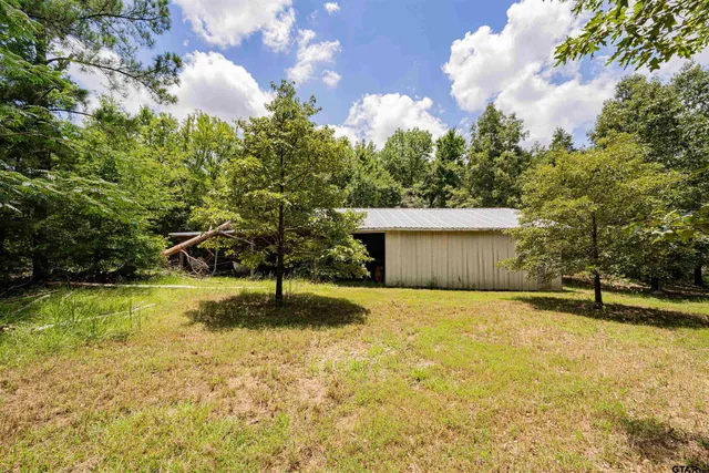 a view of an outdoor space and swimming pool