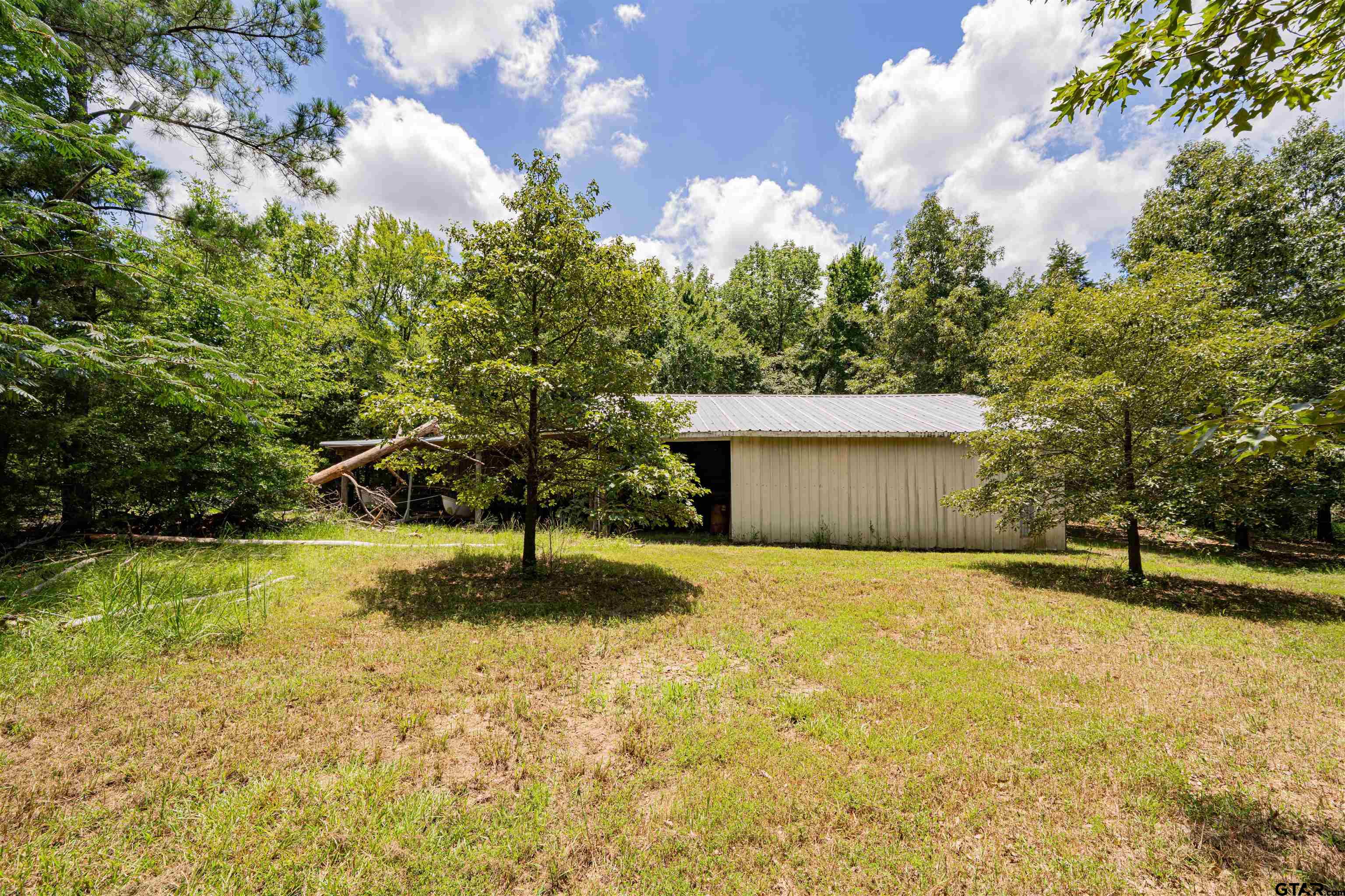 4510 Cr 2010 Mount Mount Vernon, TX 75457 - Photo 14 of 44 a view of an outdoor space and swimming pool