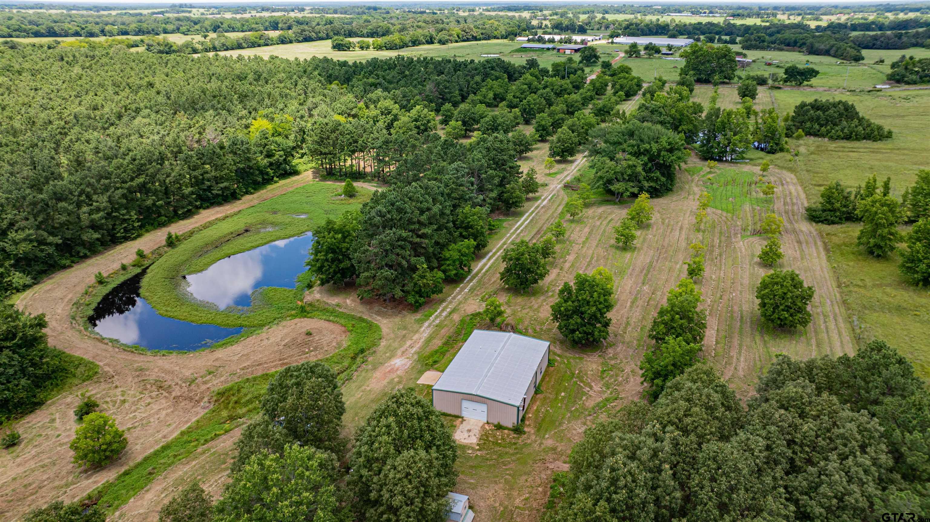 4510 Cr 2010 Mount Mount Vernon, TX 75457 - Photo 34 of 44 an aerial view of a house with a yard