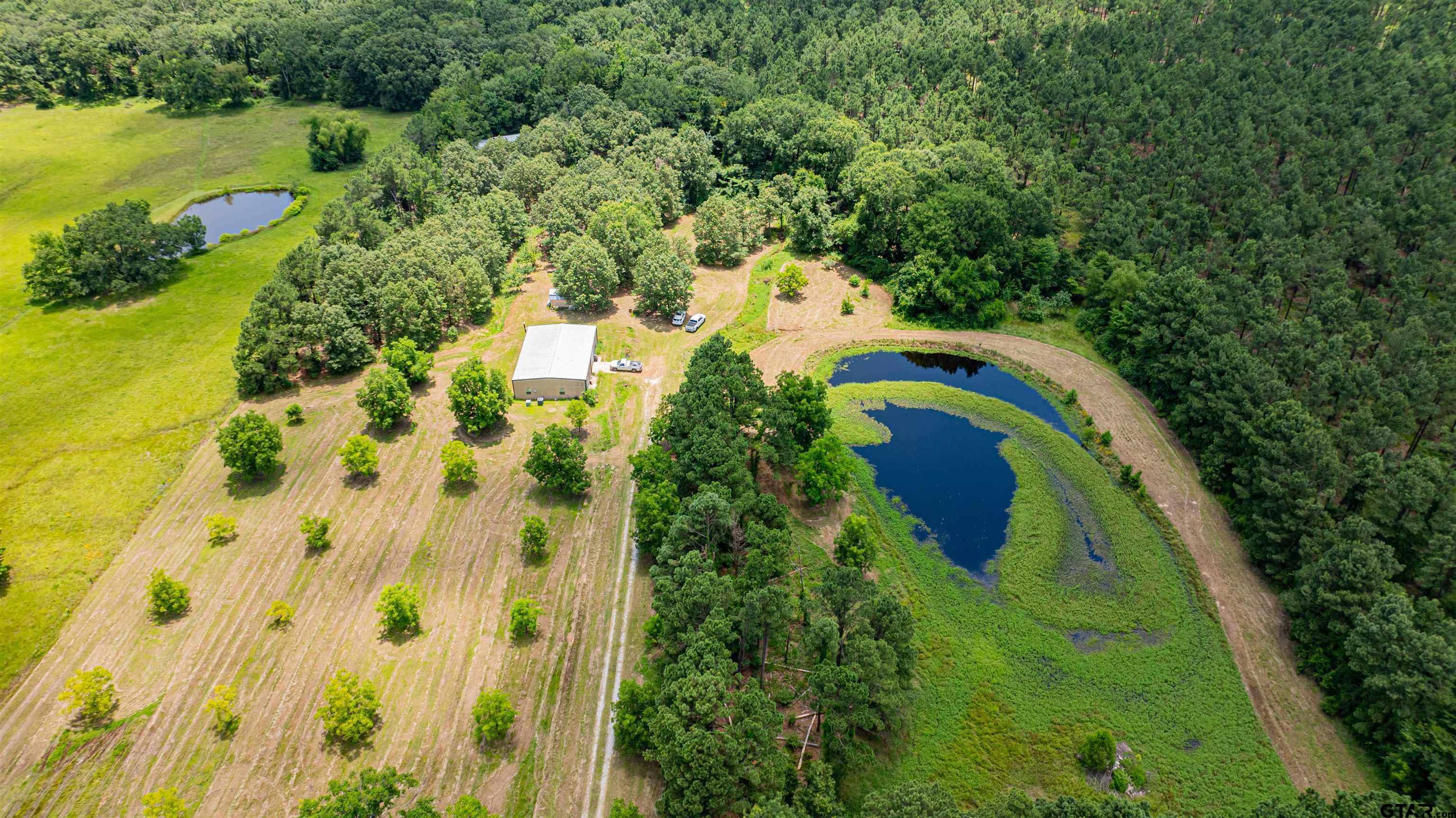 4510 Cr 2010 Mount Mount Vernon, TX 75457 - Photo 39 of 44 an aerial view of residential house with outdoor space and swimming pool