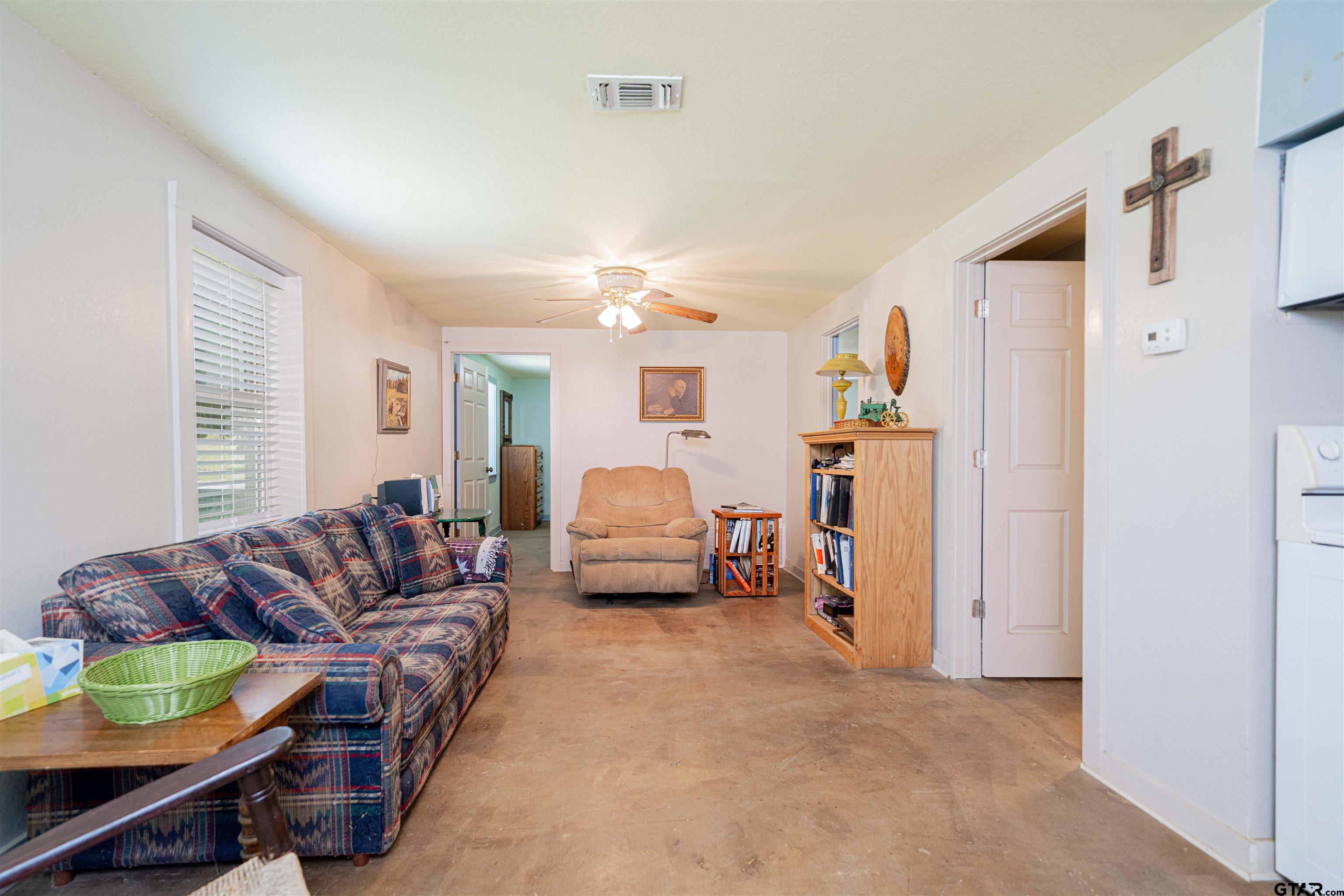 4510 Cr 2010 Mount Mount Vernon, TX 75457 - Photo 4 of 44 a living room with furniture and a couch