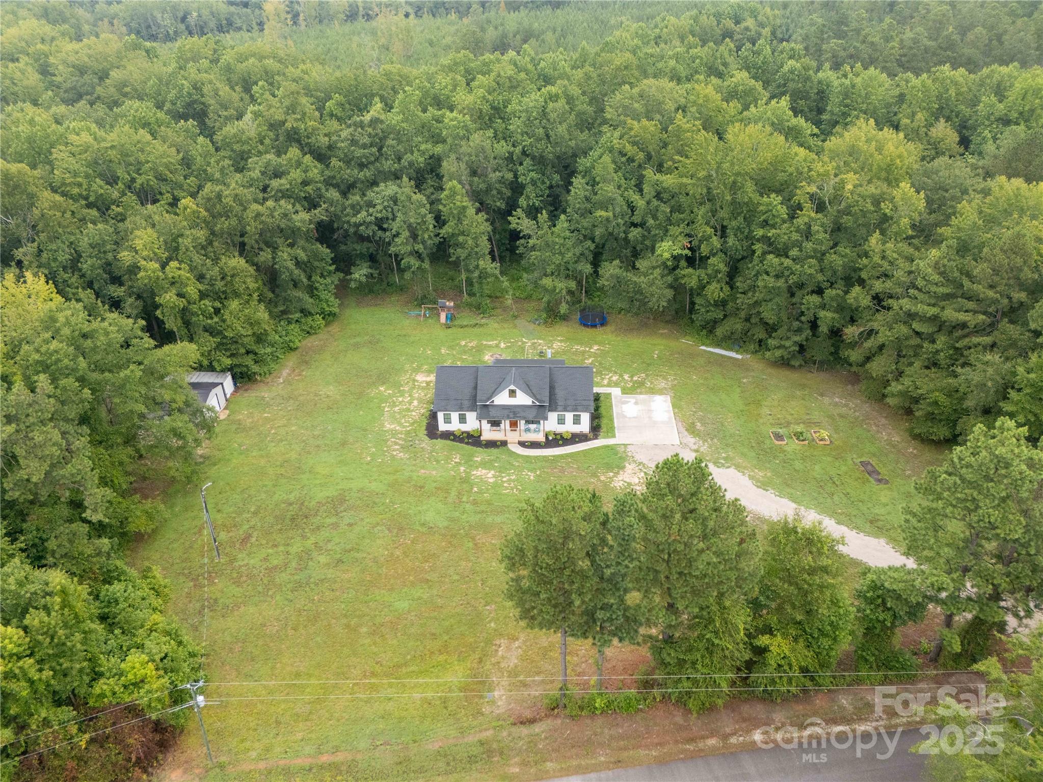 1964 Conservancy Road Kershaw, SC 29067 - Photo 25 of 26 a view of a back yard of a building
