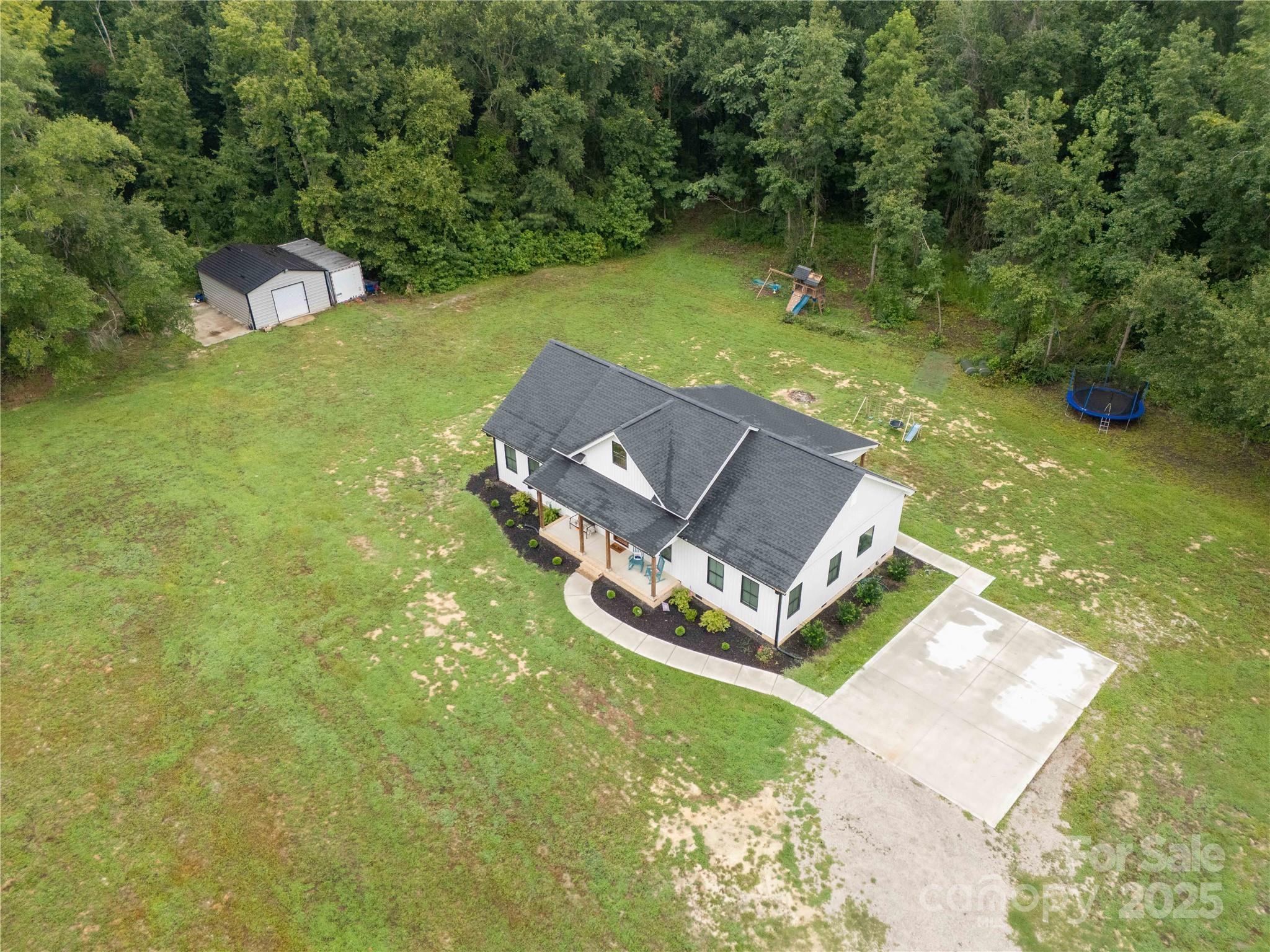 1964 Conservancy Road Kershaw, SC 29067 - Photo 26 of 26 an aerial view of a house with a yard
