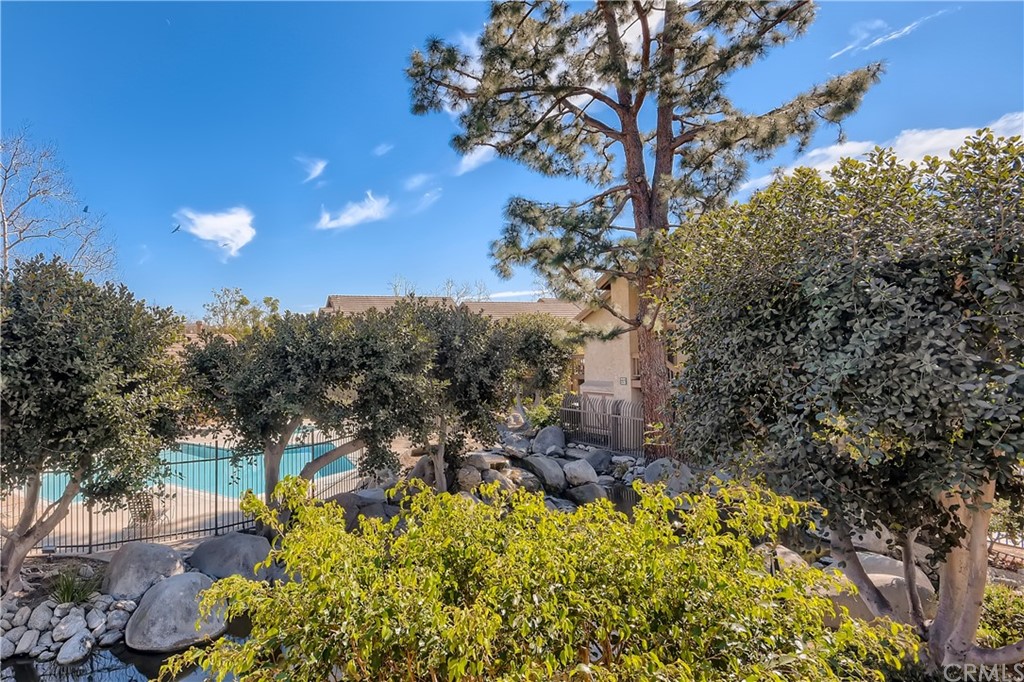 207 Orange Blossom, Unit 23 Irvine, CA 92618 - Photo 28 of 28 a view of a garden