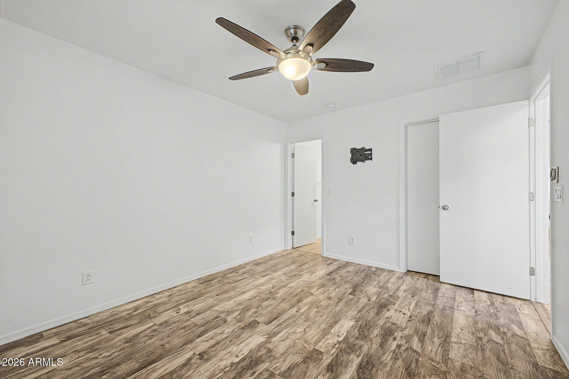 1882 West Rd Agent Street Apache Junction, AZ 85120 - Photo 17 of 26 a view of a big room with wooden floor