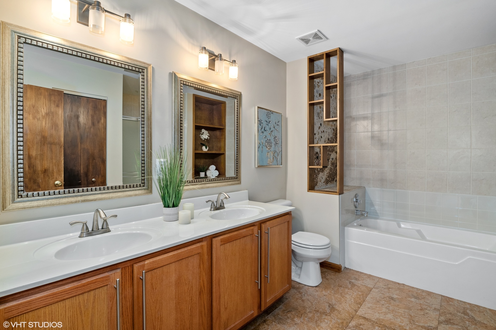 611 North Red Deer Road, Unit 433402 Round Lake, IL 60073 - Photo 11 of 15 a bathroom with a granite countertop sink toilet mirror and bathtub