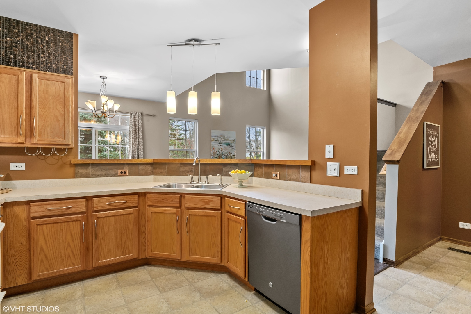 611 North Red Deer Road, Unit 433402 Round Lake, IL 60073 - Photo 5 of 15 a kitchen with a sink stove and cabinets