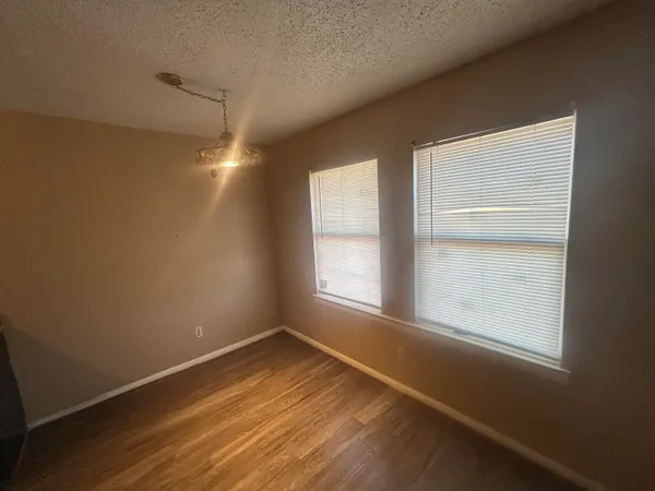 a kitchen with a stove and a microwave