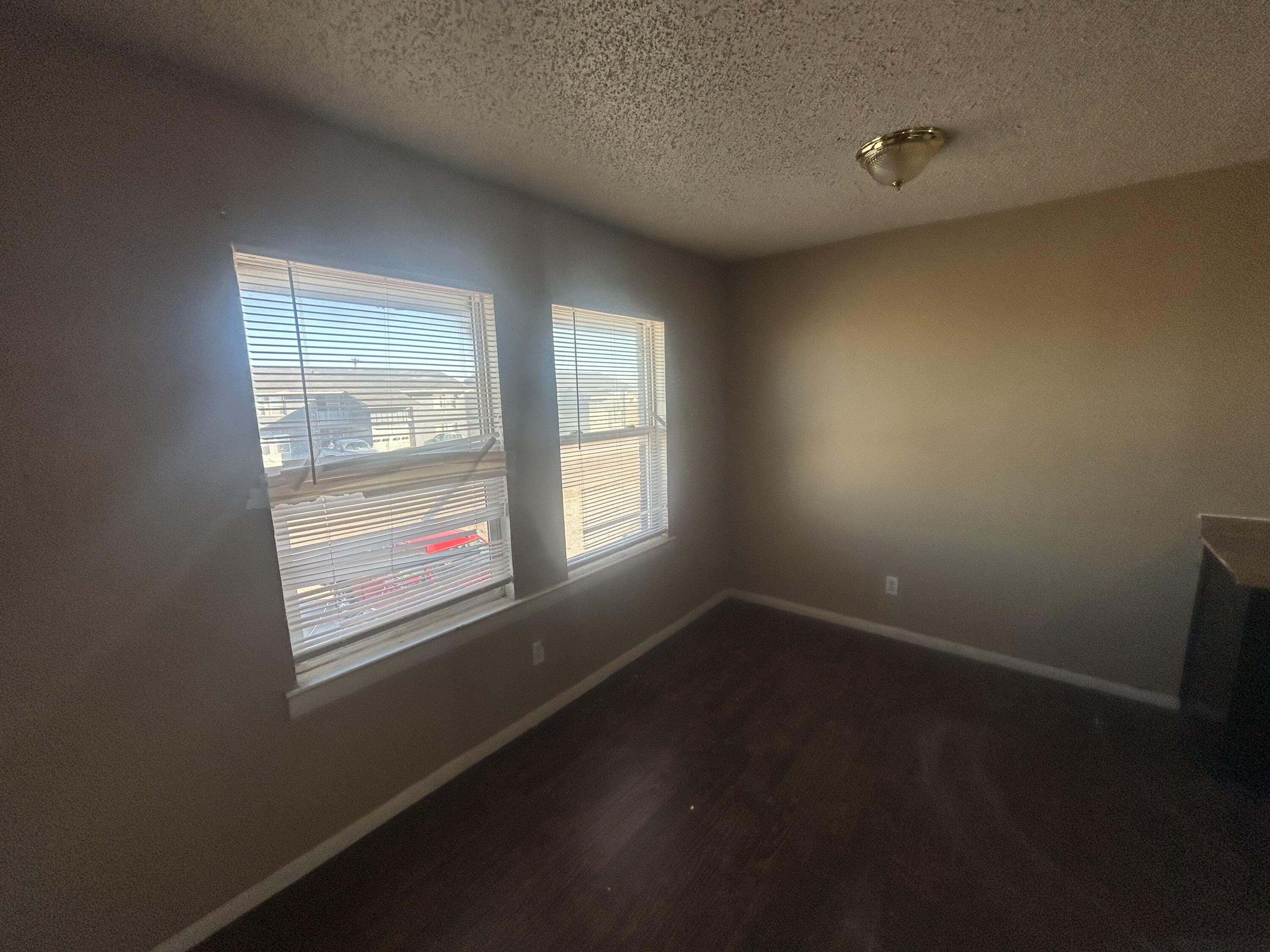 100 Pecos Place Plainview, TX 79072 - Photo 20 of 32 an empty room with a window