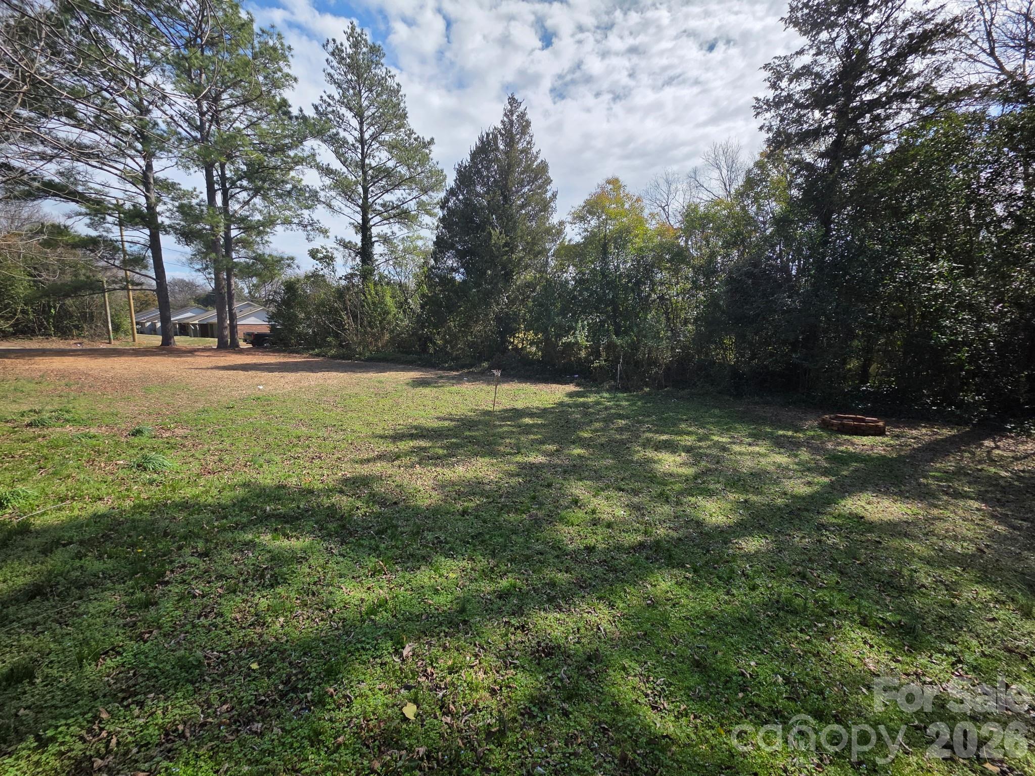 105 Culp Street Chester, SC 29706 - Photo 5 of 6 a view of outdoor space with trees all around