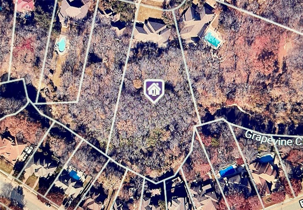 Large wooded lot with creek running along back of property